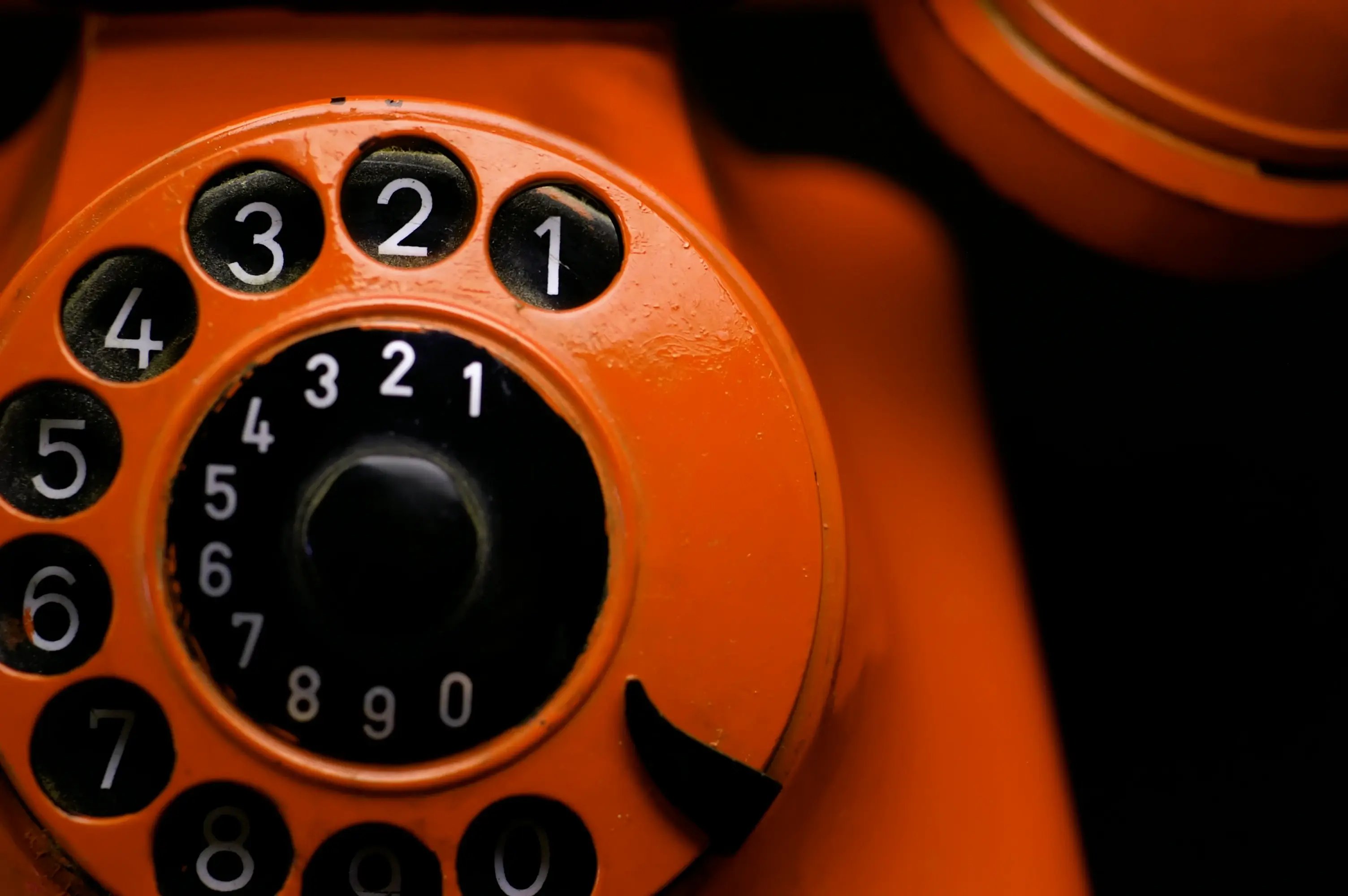 orange-retro-phone-close-up-2026-03-17-22-44-42-utc
