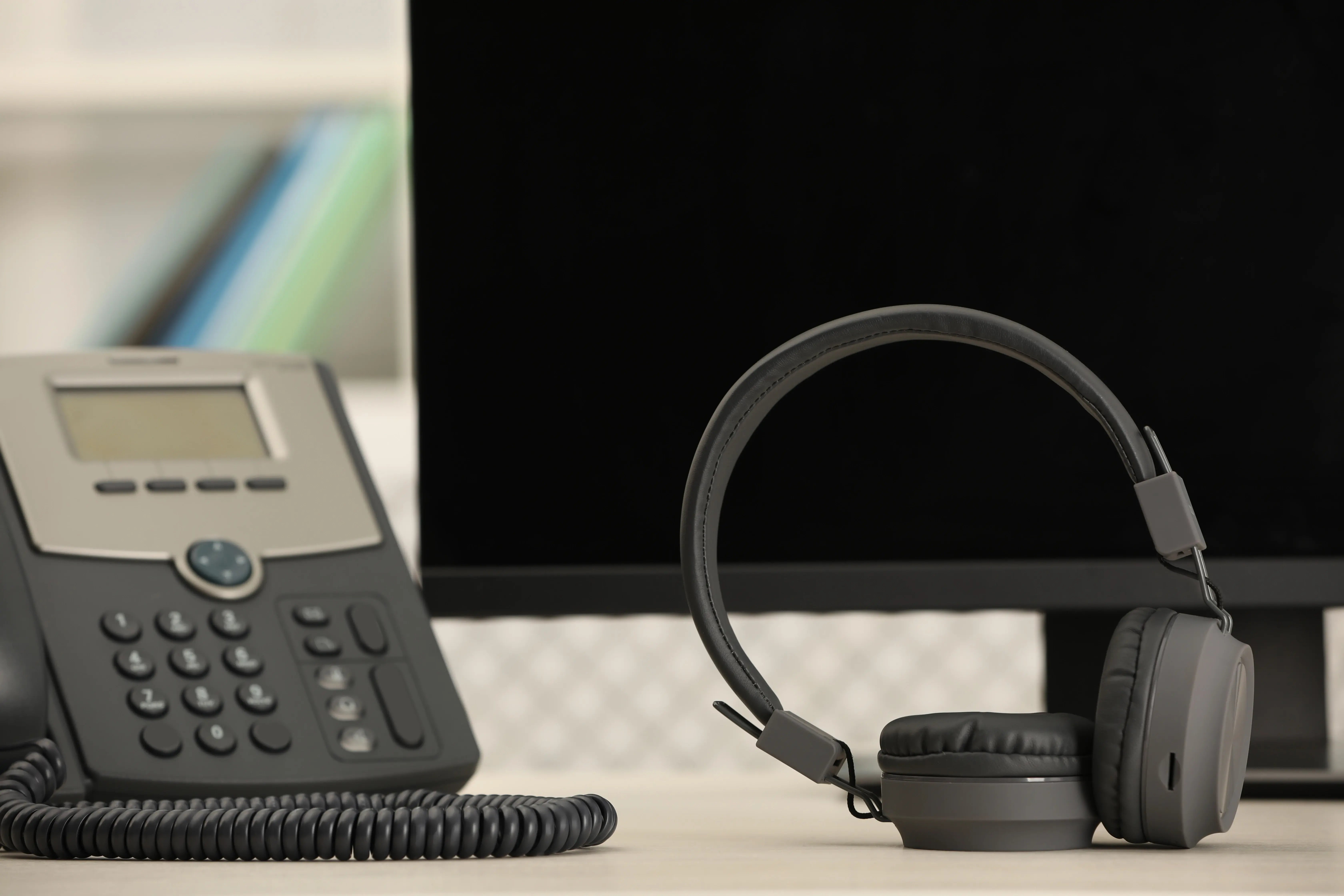 telephone-and-headset-on-a-desk-in-office-2026-03-27-01-41-55-utc