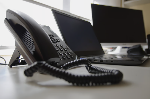 SIP trunk provider supporting business phone calls through a desk-based office phone system.